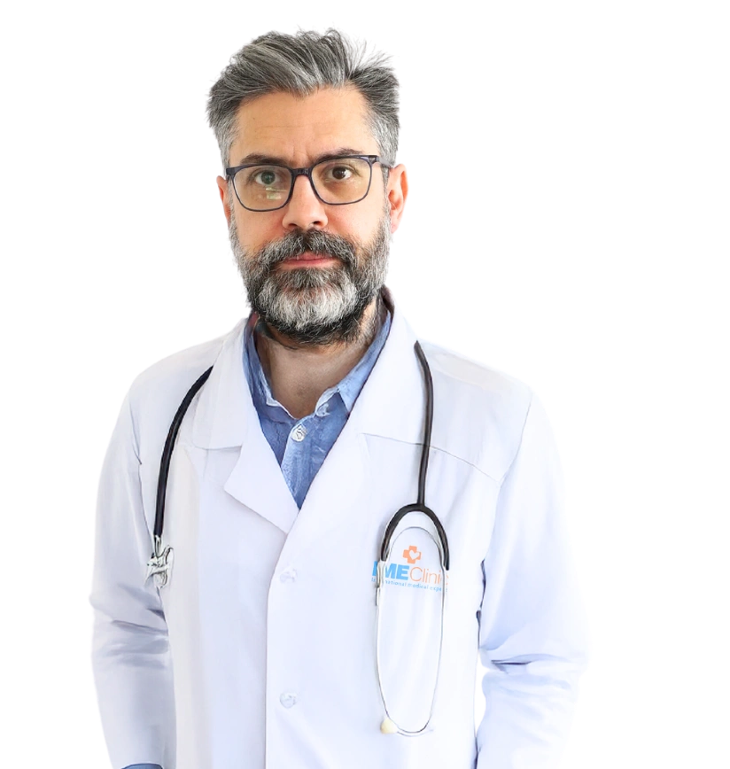 Emre Kocman, renowned plastic surgeon for face and neck lifts, pictured in a white coat with a stethoscope.